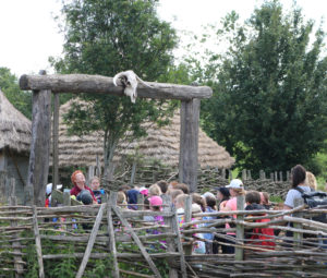 Schoolchildren entering the Iron Age enclosure